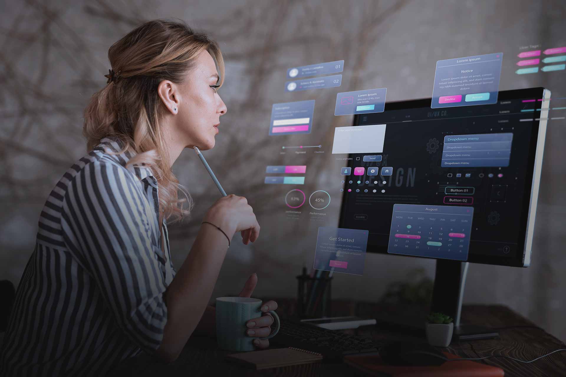 mulher sentada analisando gráficos em tela de computador