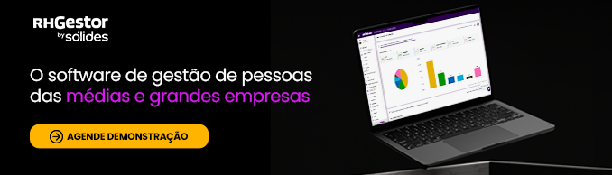 computador em frente a um fundo preto com a tela aberta no sistema da RHGestor by Sólides mostrando gráficos de barras